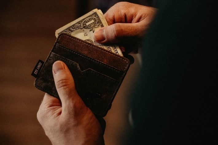 Title Loans Michigan 4 wallet with money