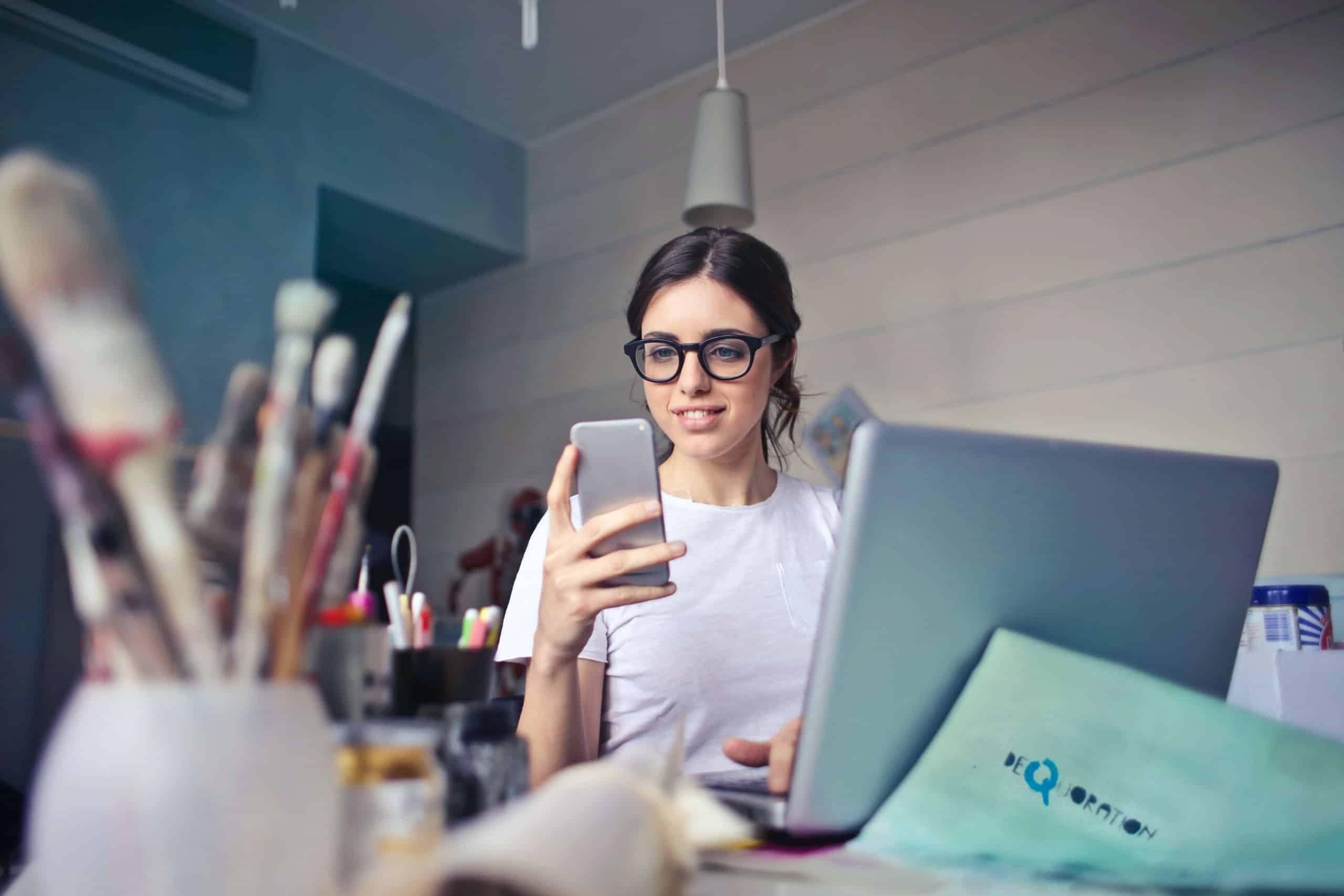 Online Title Loans in Indiana 1 woman looking at phone